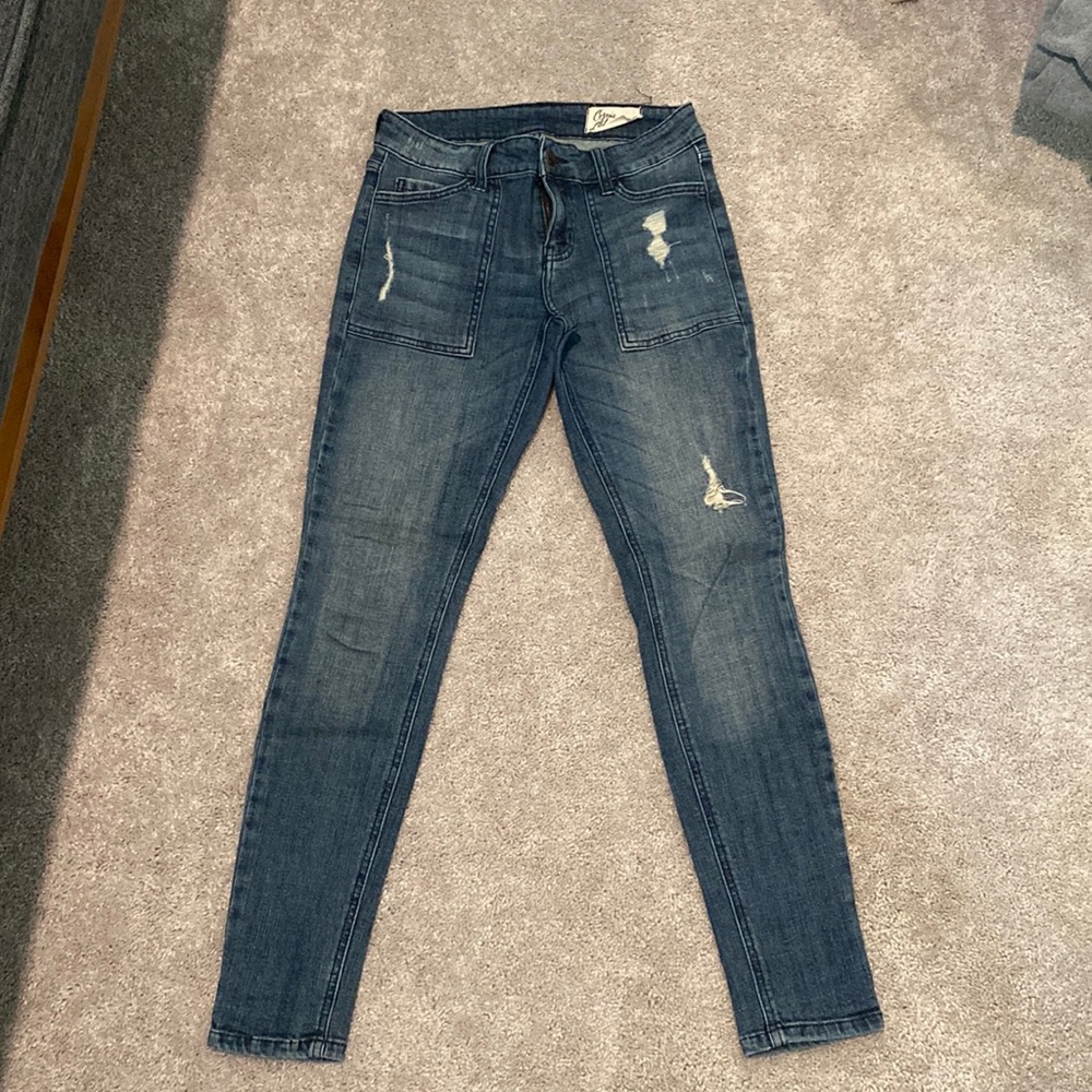 Women’s Cosmic Blue Love skinny jeans in dark wash. Size 26